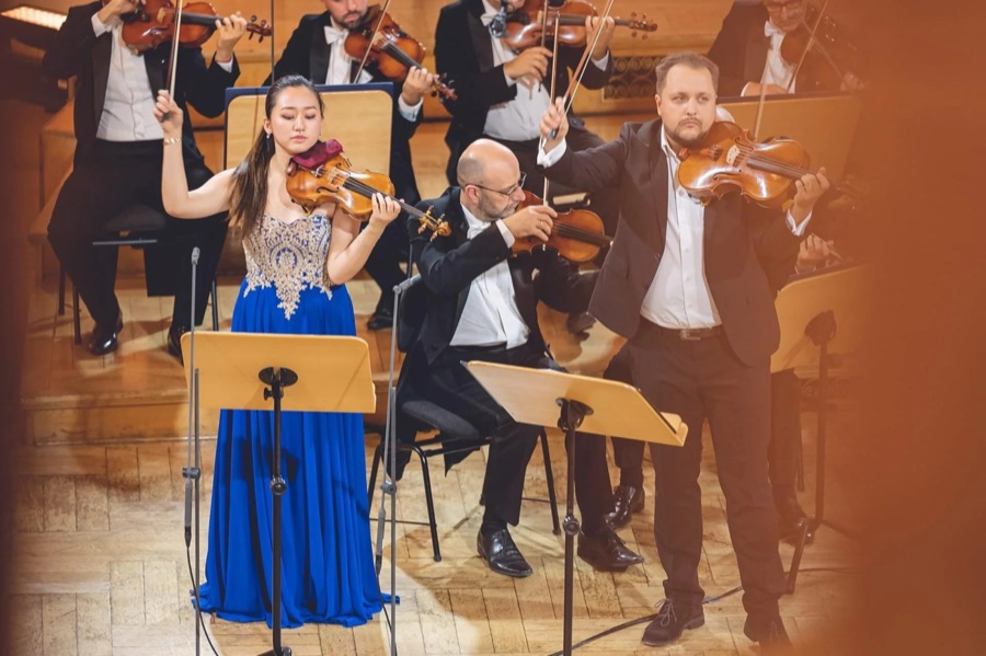 Karen Su performing as soloist with orchestra
